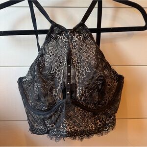 Victoria’s Secret black lace bra, size 36C, labeled “very sexy”